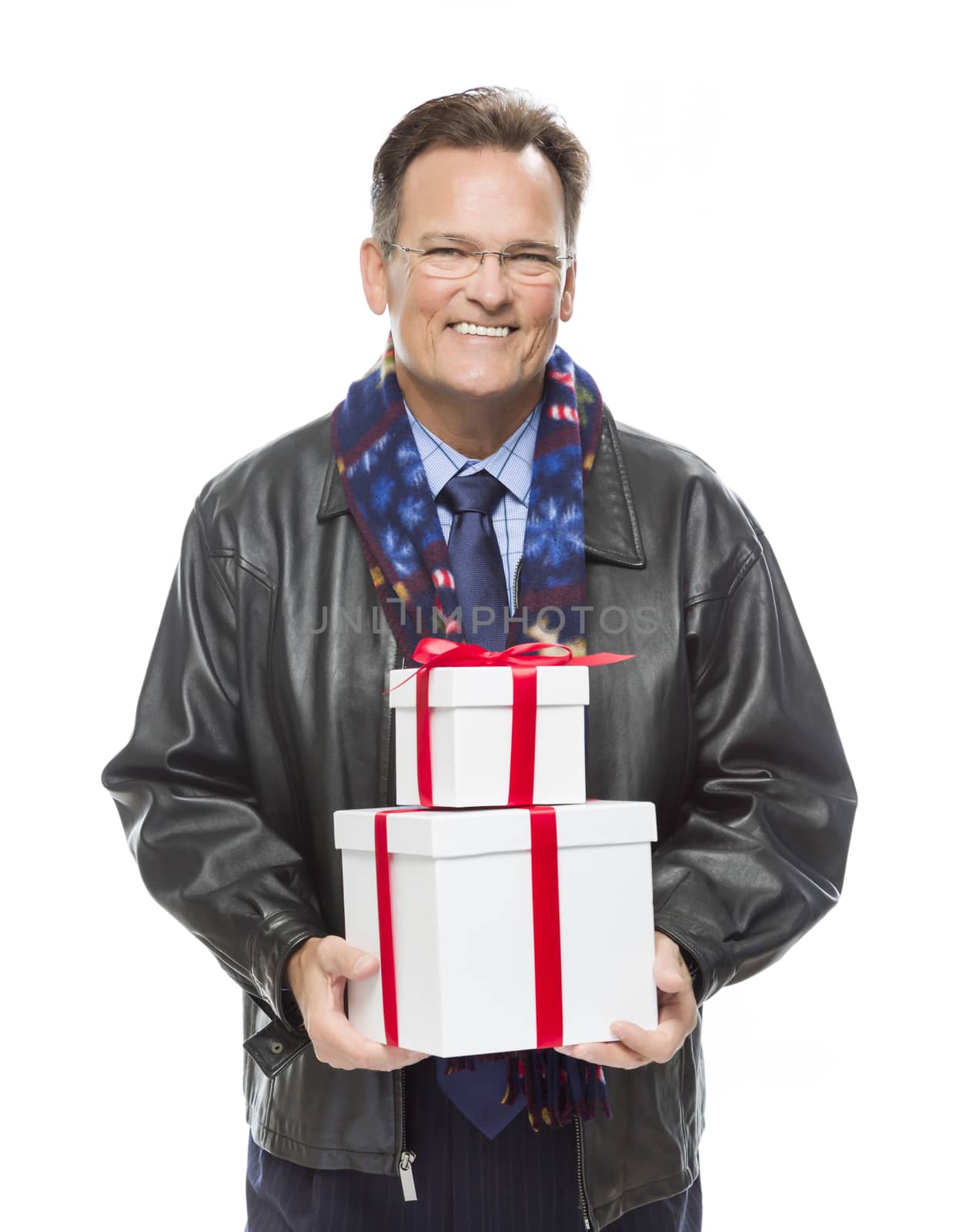 Handsome Man Wearing Black Leather Jacket and Holiday Scarf Holding Christmas Gifts Isolated on White Background.