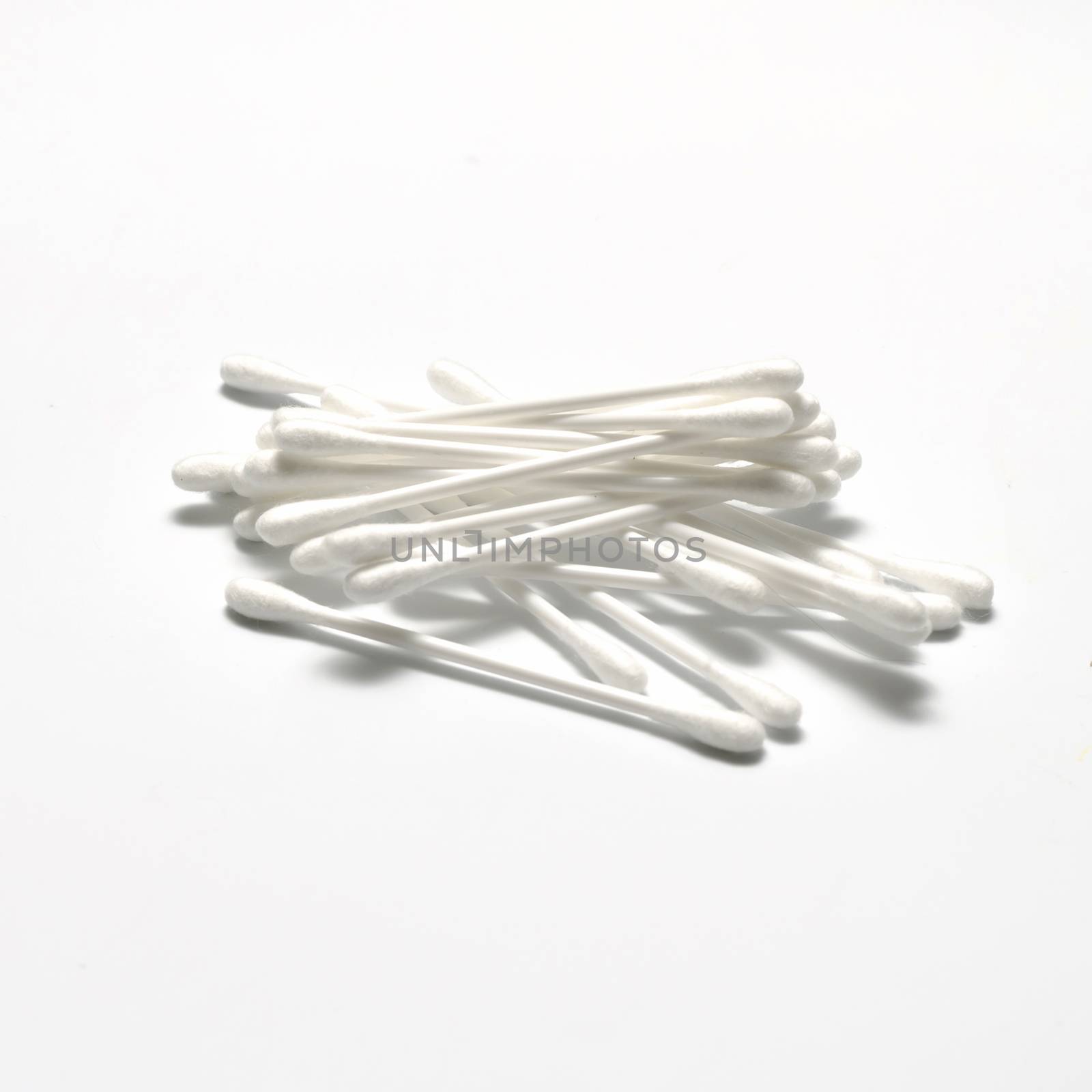 cotton buds on a white bacground