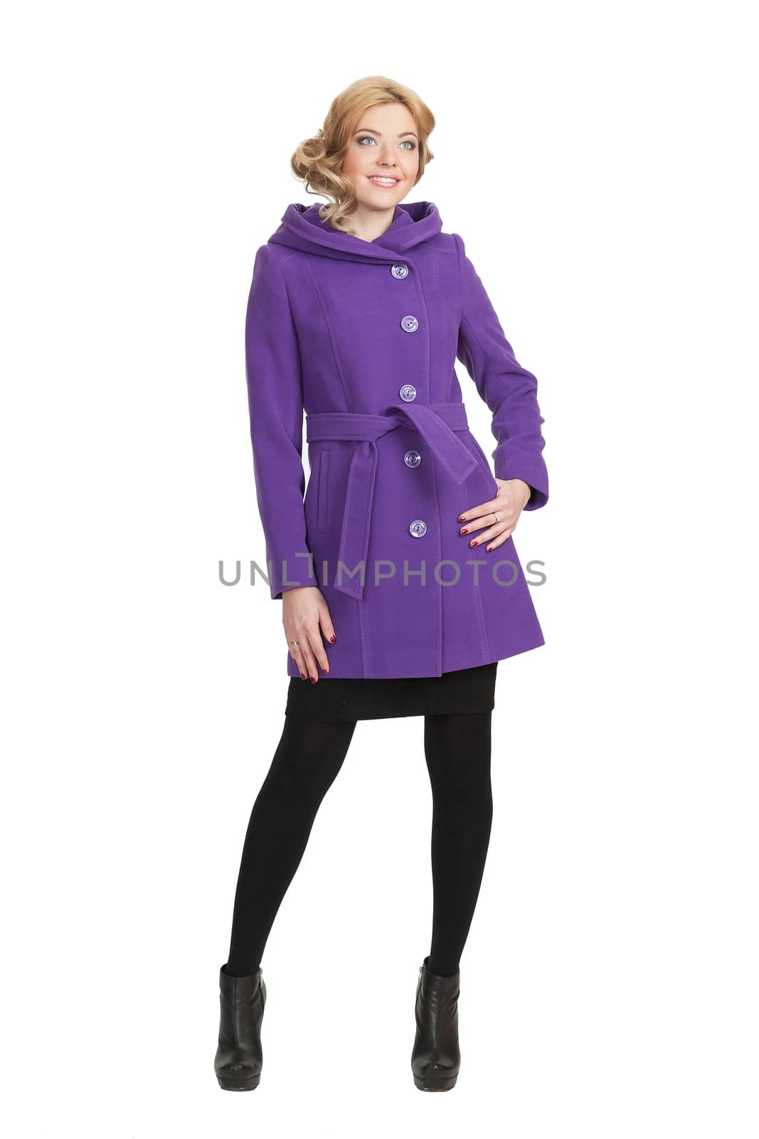 The girl in a violet autumn coat on a white background