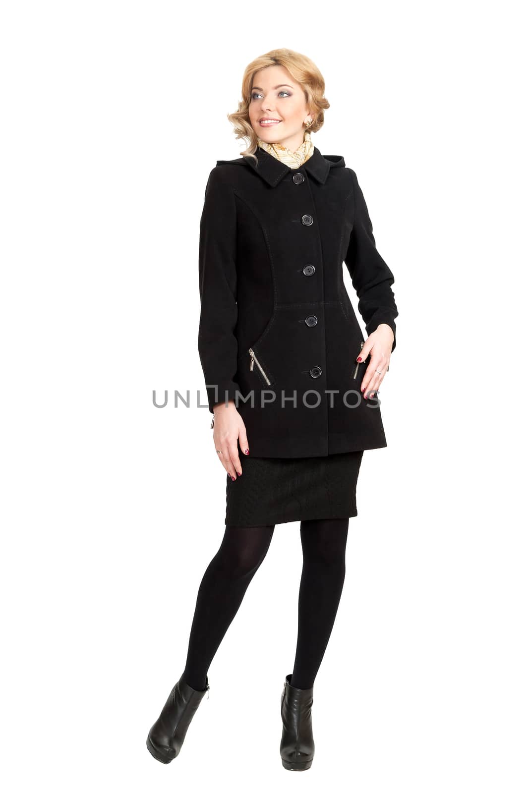 The girl in a black autumn coat on a white background