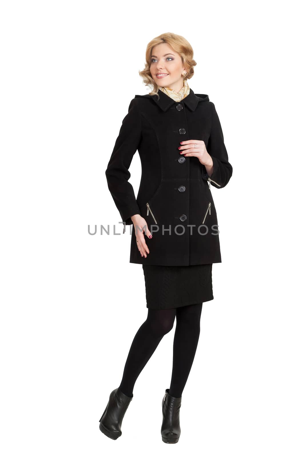 The girl in a black autumn coat on a white background