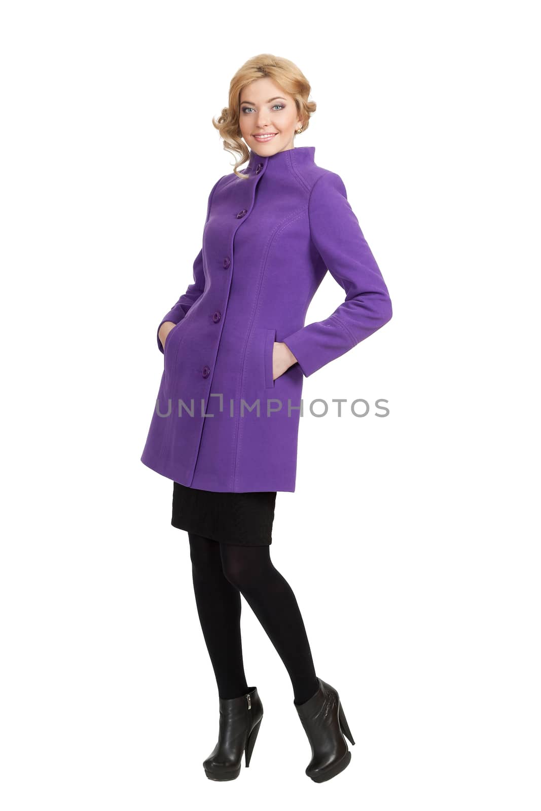 The girl in a violet autumn coat on a white background