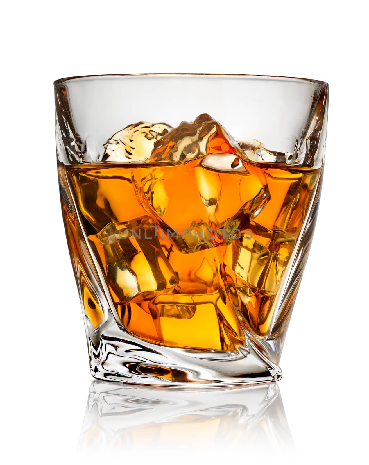 Glass of whiskey isolated on a white background