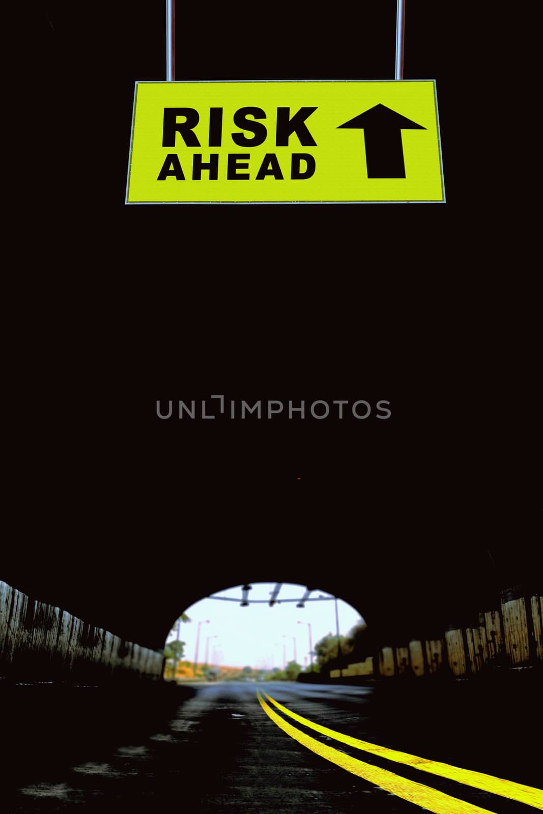 A Notice Board On A National Highway tunnel  Showing Risk ahead Concept