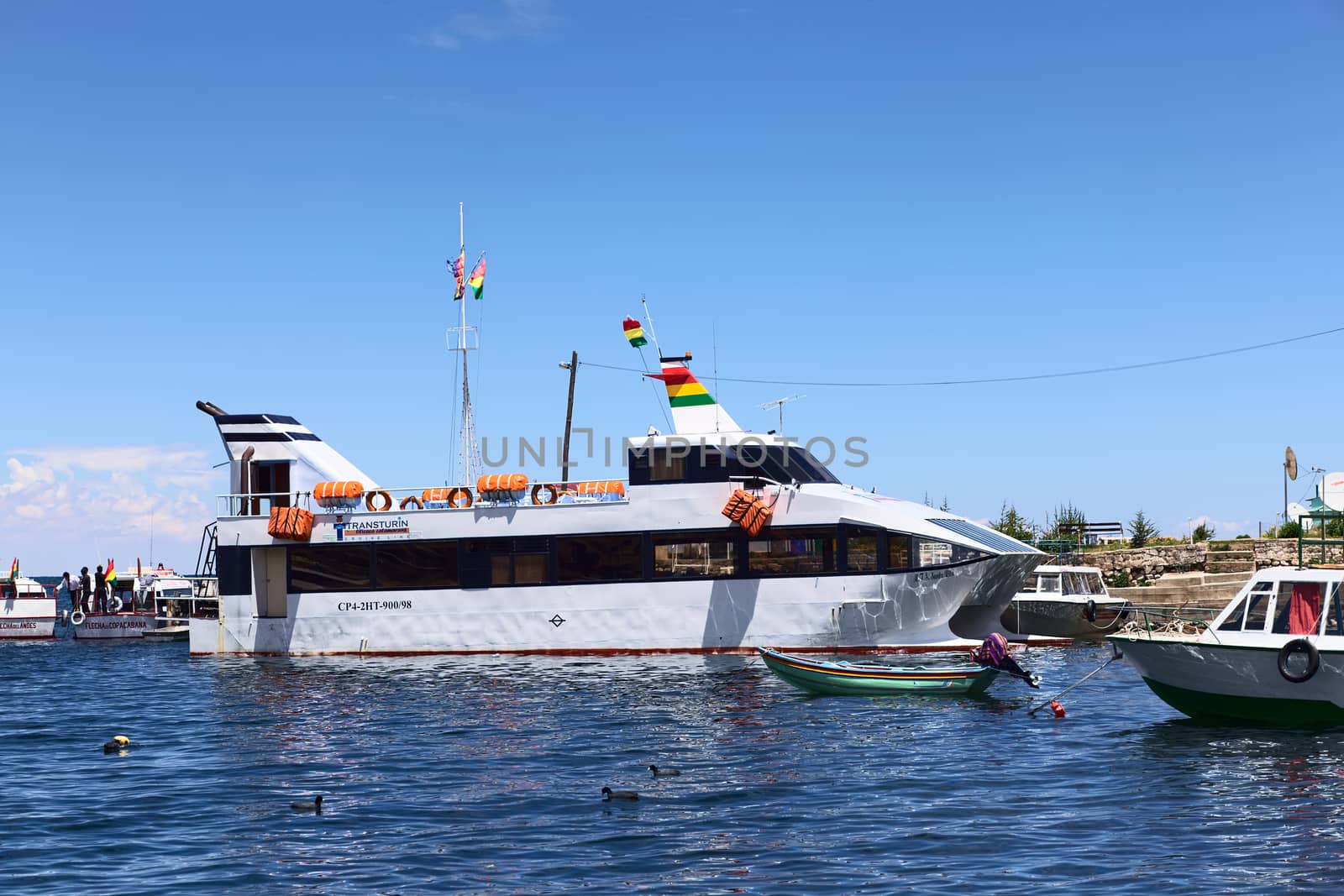 COPACABANA, BOLIVIA - OCTOBER 28, 2014: Big passenger ferry in the harbor of the small tourist town on the shore of Lake Titicaca on October 28, 2014 in Copacabana, Bolivia 