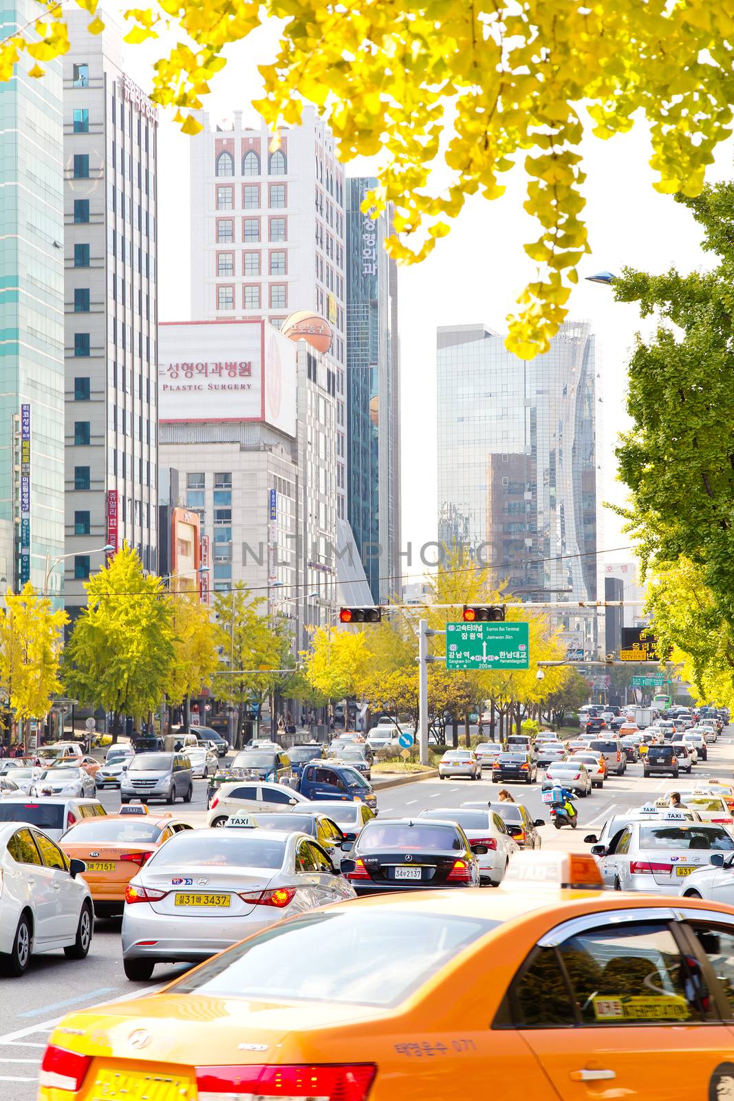 Seoul, Republic of Korea - November 4, 2014: Traffic approaching on a busy road through the Gangnam district on November 4, 2014 in seoul, Gangnam is an affluent district in Seoul, South Korea.