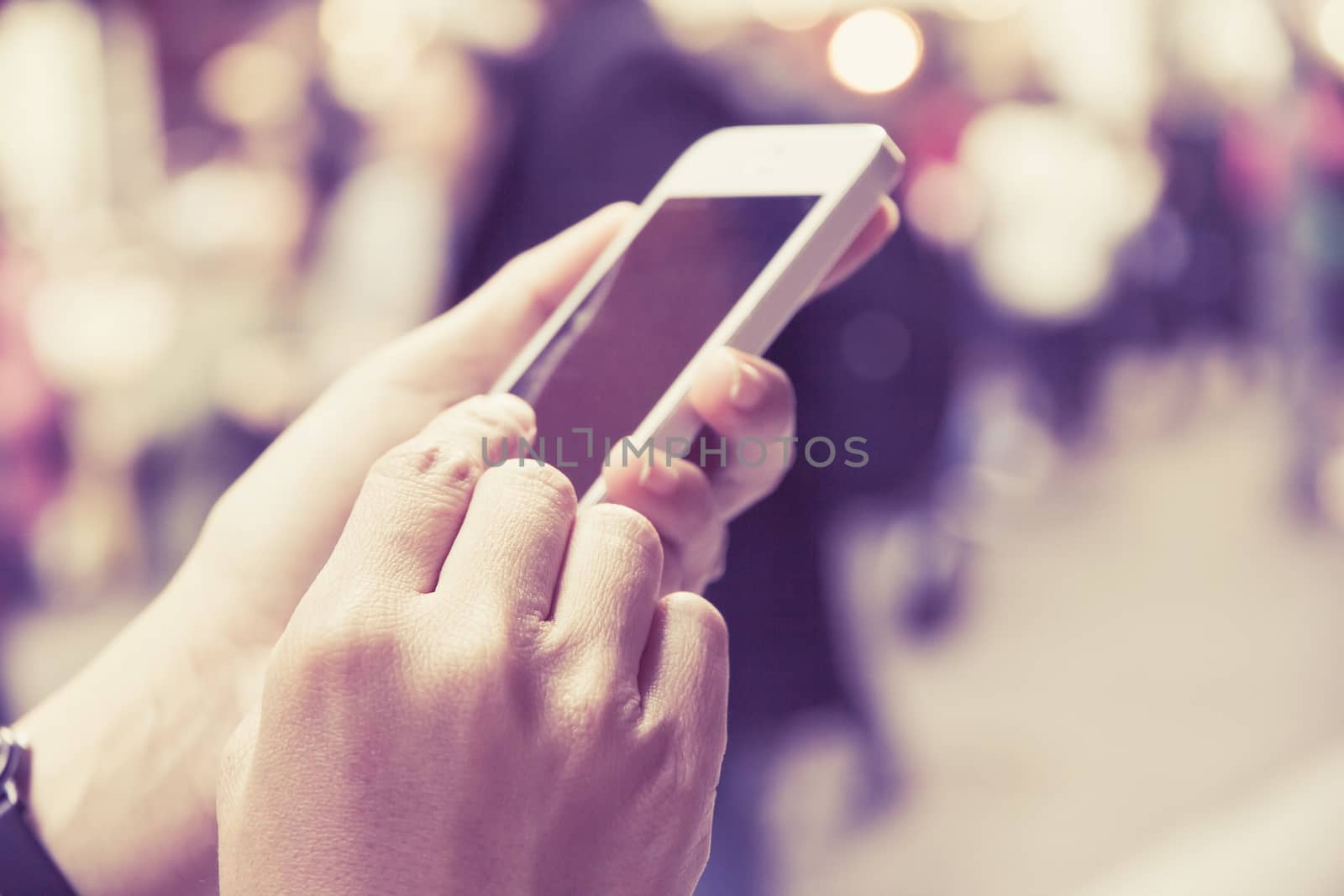 Teenage girl text messaging on her phone