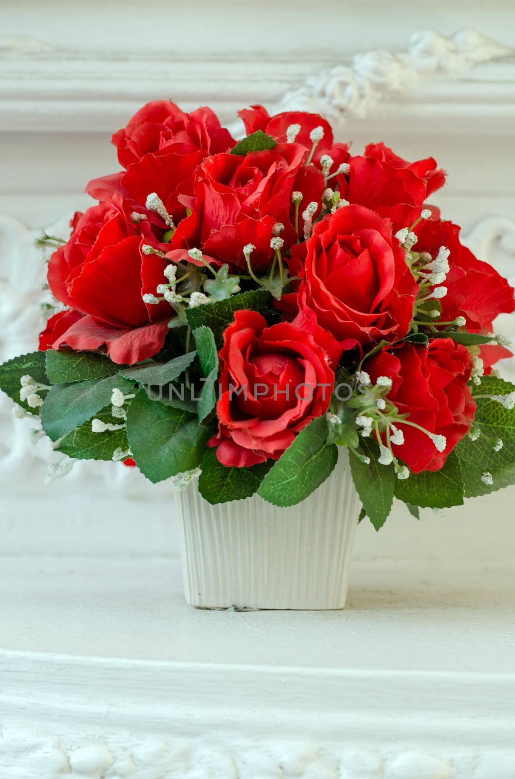 Beautiful artificial roses in vintage style
