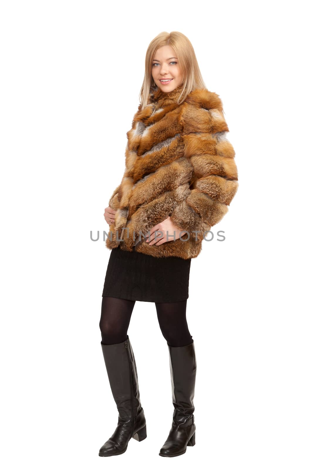 The blue-eyed blonde in a magnificent fur coat, it is isolated on a white background