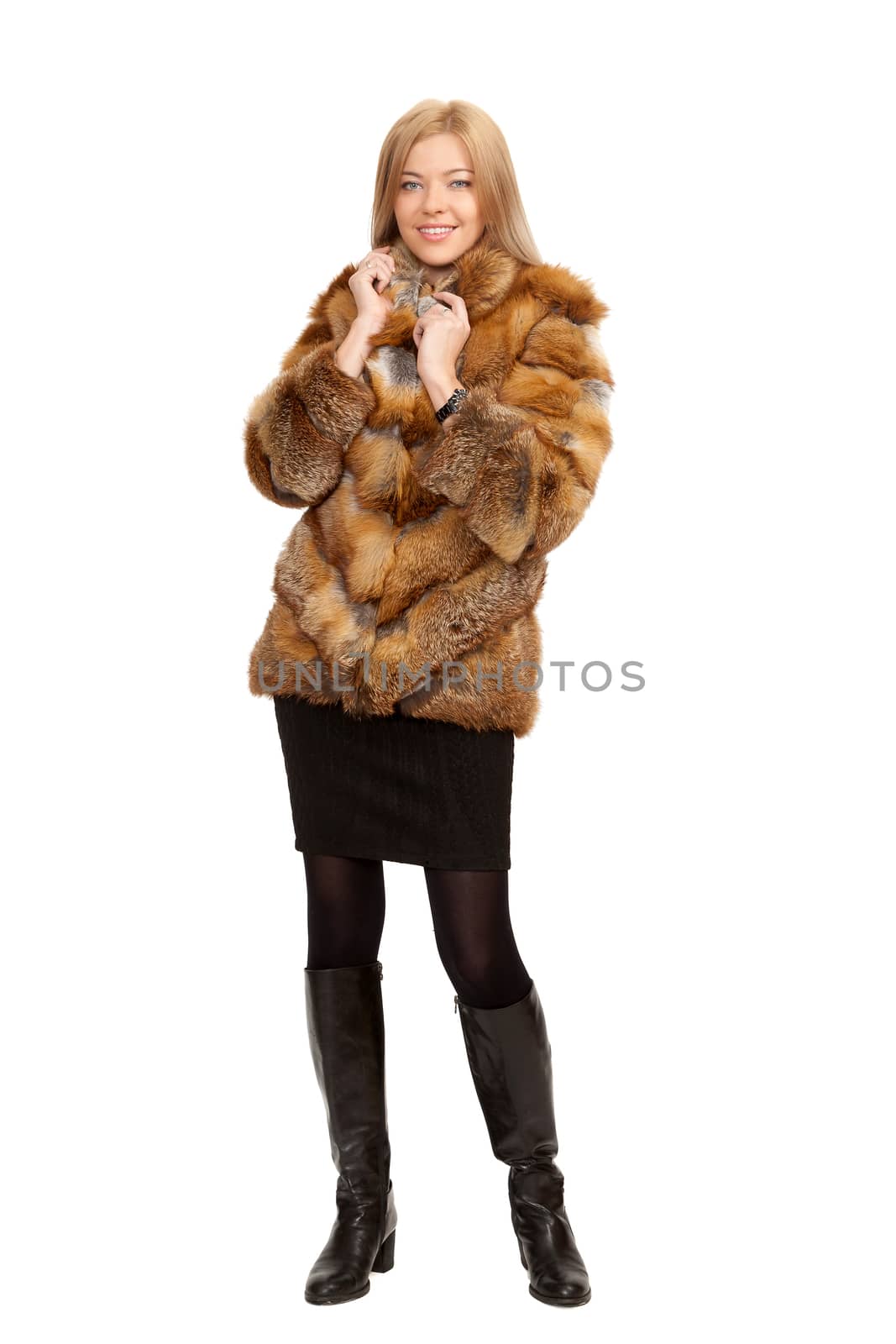 The blue-eyed blonde in a magnificent fur coat, it is isolated on a white background