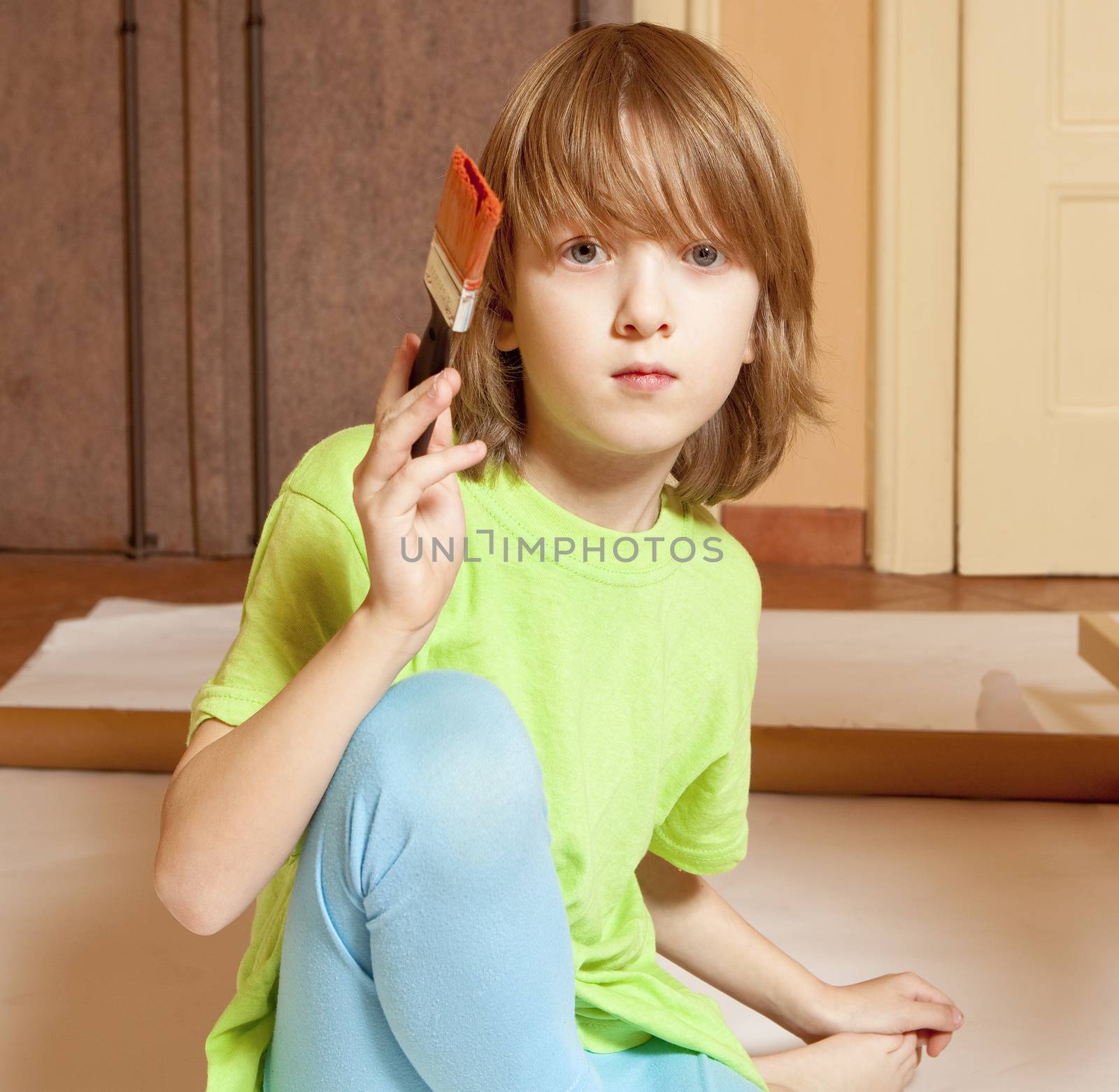 Portrait of a Boy Painting with Red Color by courtyardpix