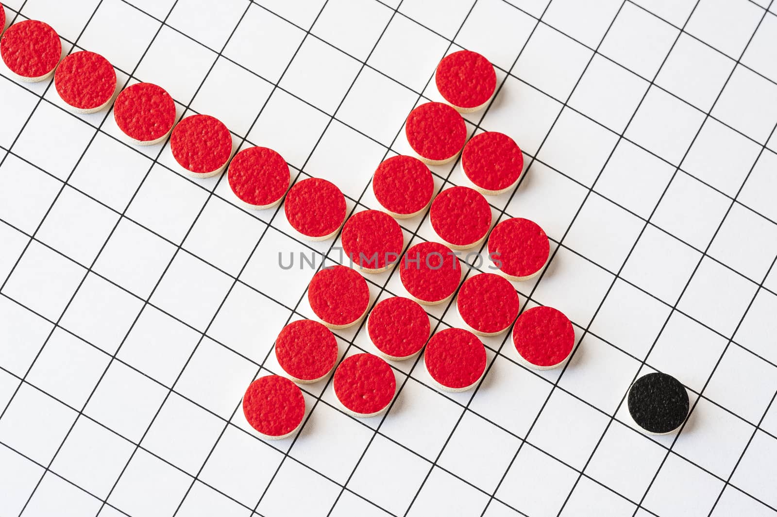Stylised graphic of a thrust against a small and weak opponent, created using counters from a game of 'Go'.