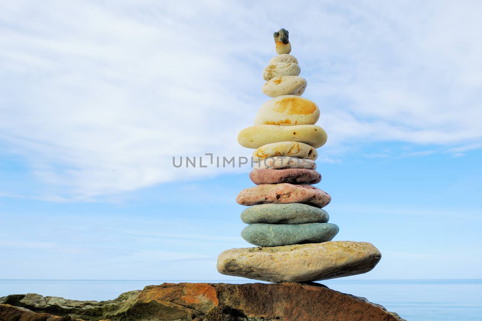 Zen balance of pebbles on the seacoast