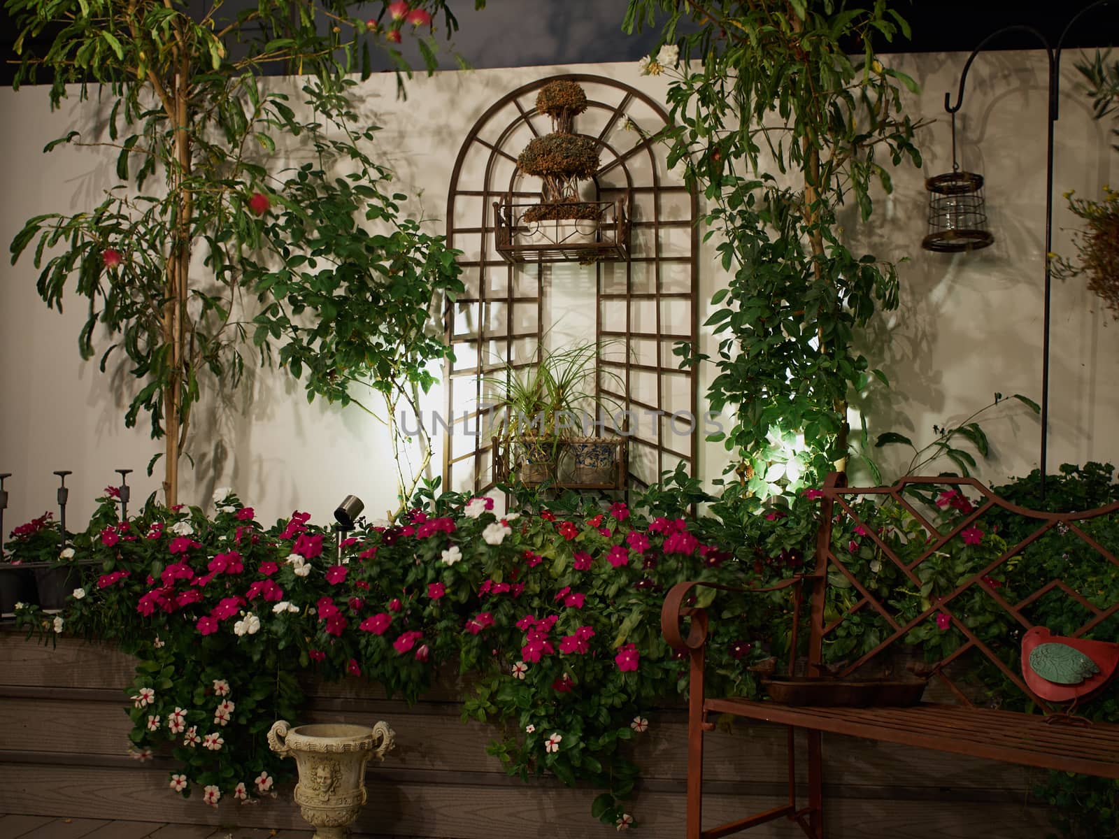 Beautiful classical design blooming rooftop garden in city urban setting