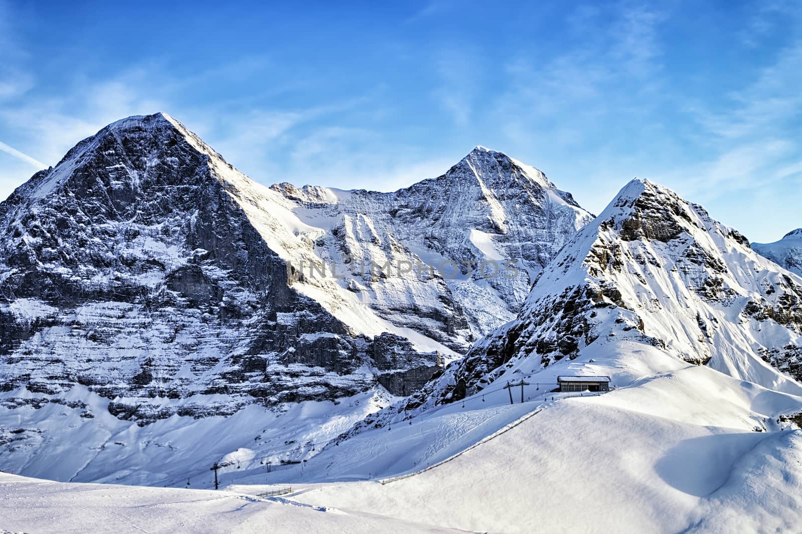 Swiss alpine peaks and ski slopes in winter Jungfrau region