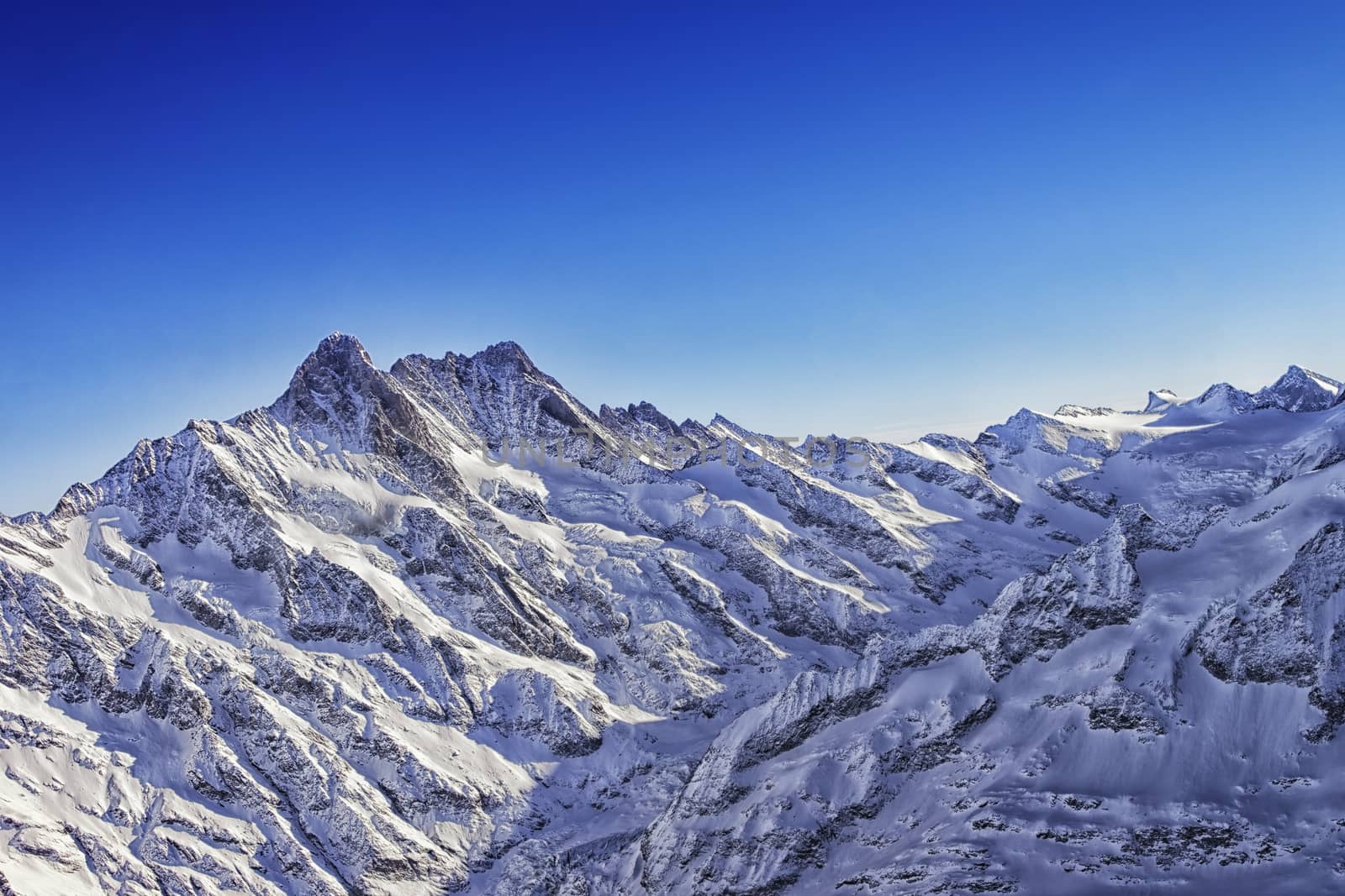 Jungfrau mountain ridge helicopter view in winter