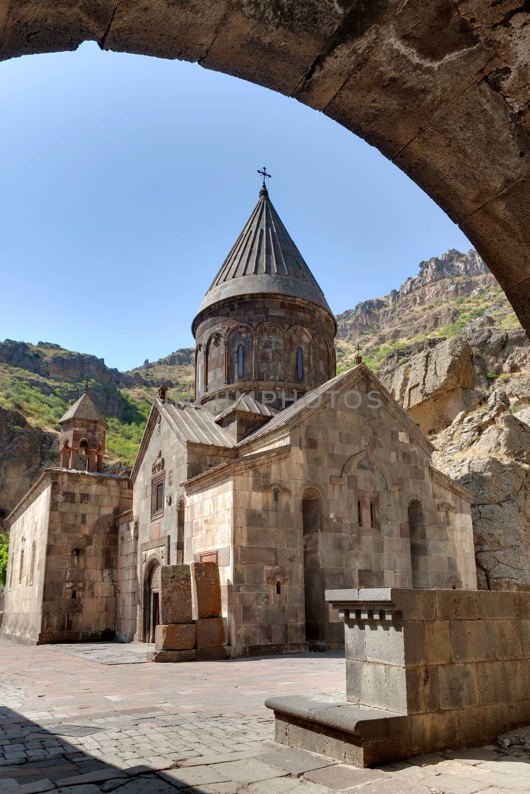 The ancient Christian temple Geghard in the mountains of Armenia.