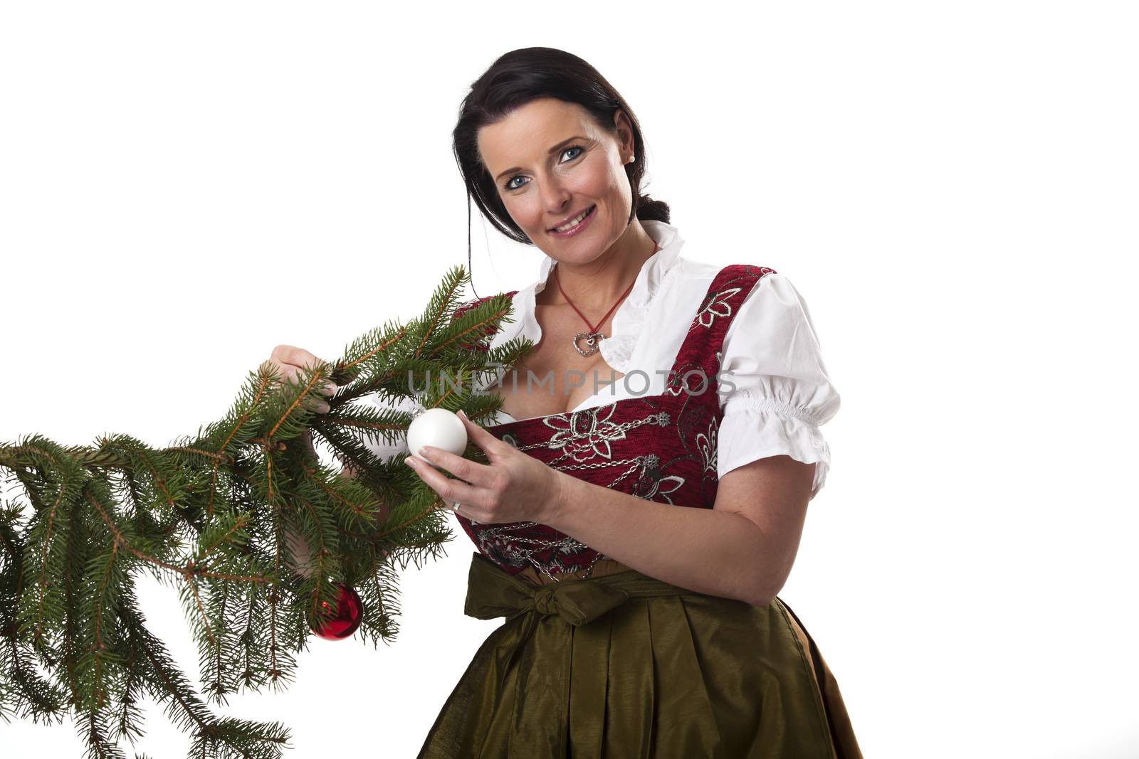 bavarian woman with a christmas tree