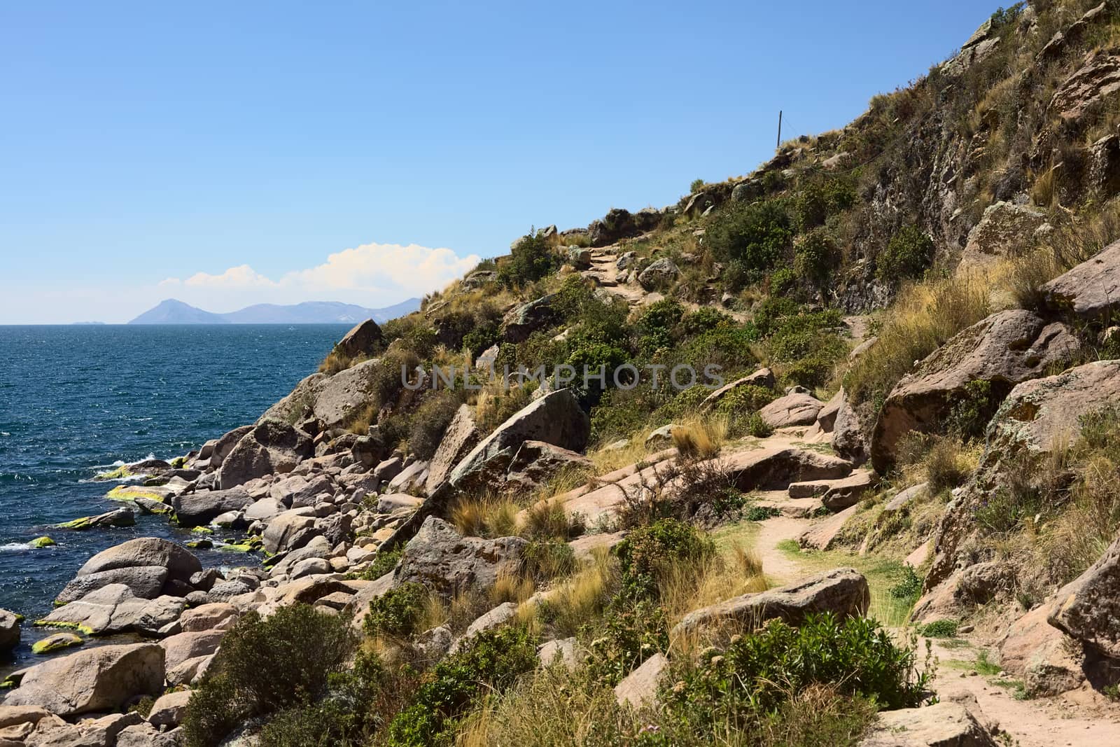 Rocky coastline of Lake Titicaca close to the small tourist town of Copacabana in Bolivia
