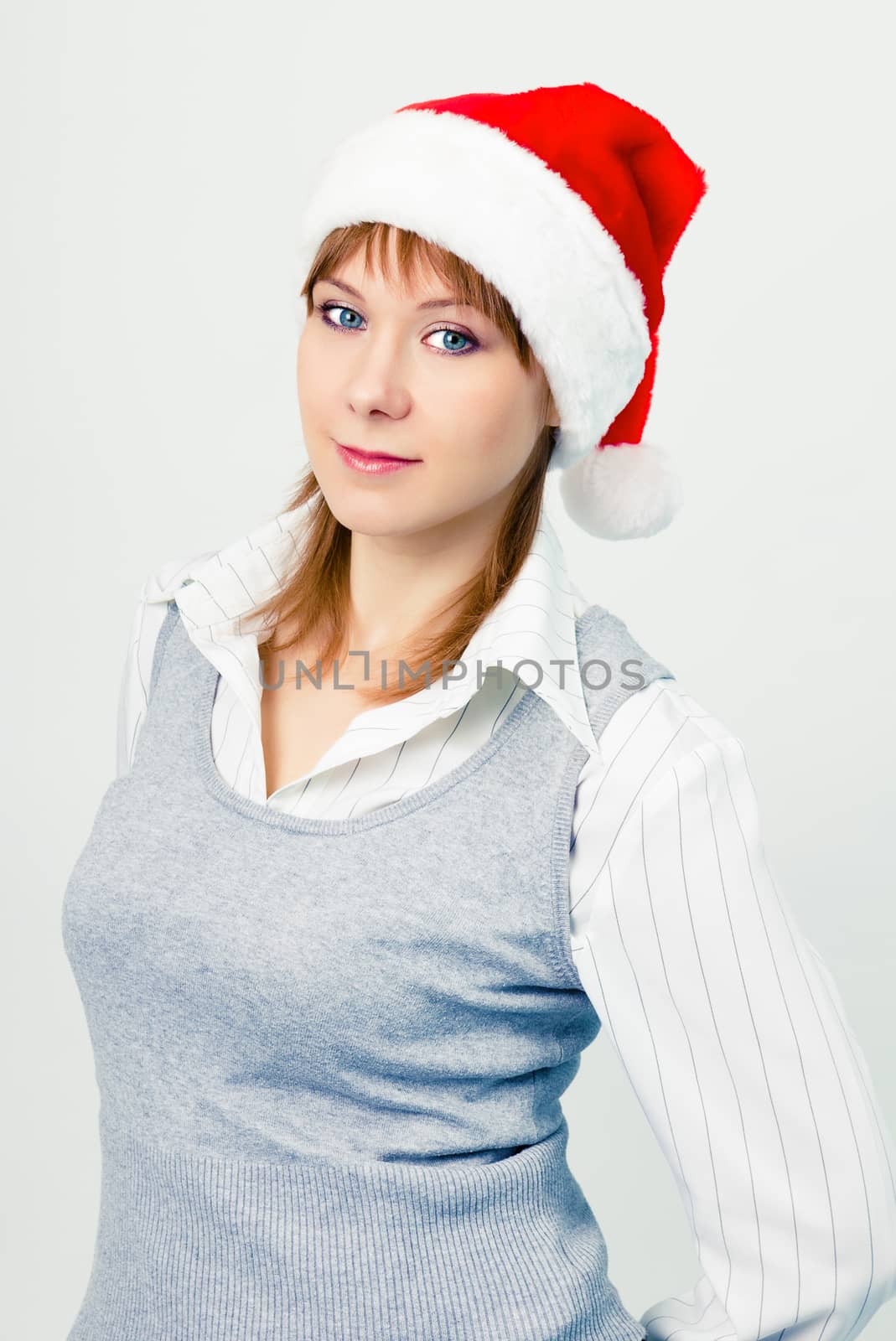 Attractive girl in santa hat. Portrait by pzRomashka