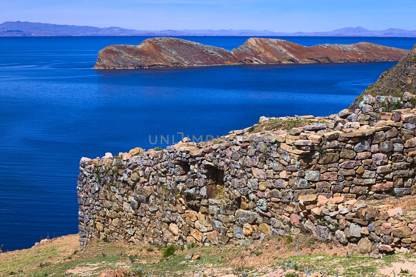 Outer wall of the Chinkana (meaning labyrinth in quechua) archeological site of Tiwanaku (Tiahuanaco) origin on the Northwestern part of the Isla del Sol (Island of the Sun) in Lake Titicaca in Bolivia. Isla del Sol is a popular tourist destination and is reachable by boat from Copacabana, Bolivia.