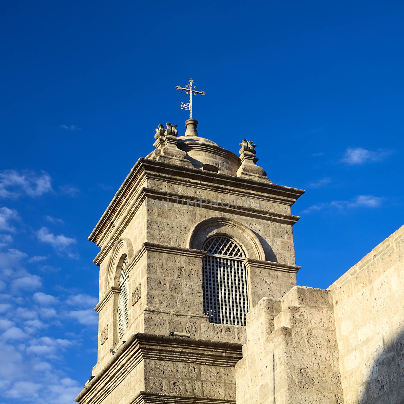 A steeple of the Monasterio de Santa Catalina (Monastery of Saint Catherine) on Santa Catalina Street in the city center of Arequipa, Peru. Arequipa is an UNESCO World Cultural Heritage Site. 