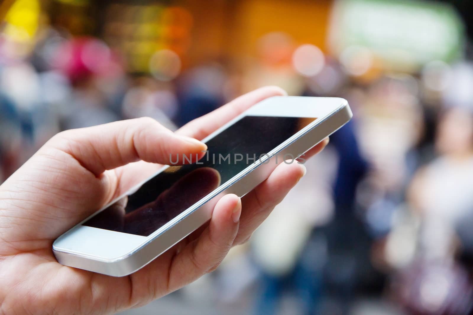 Teenage girl text messaging on her phone