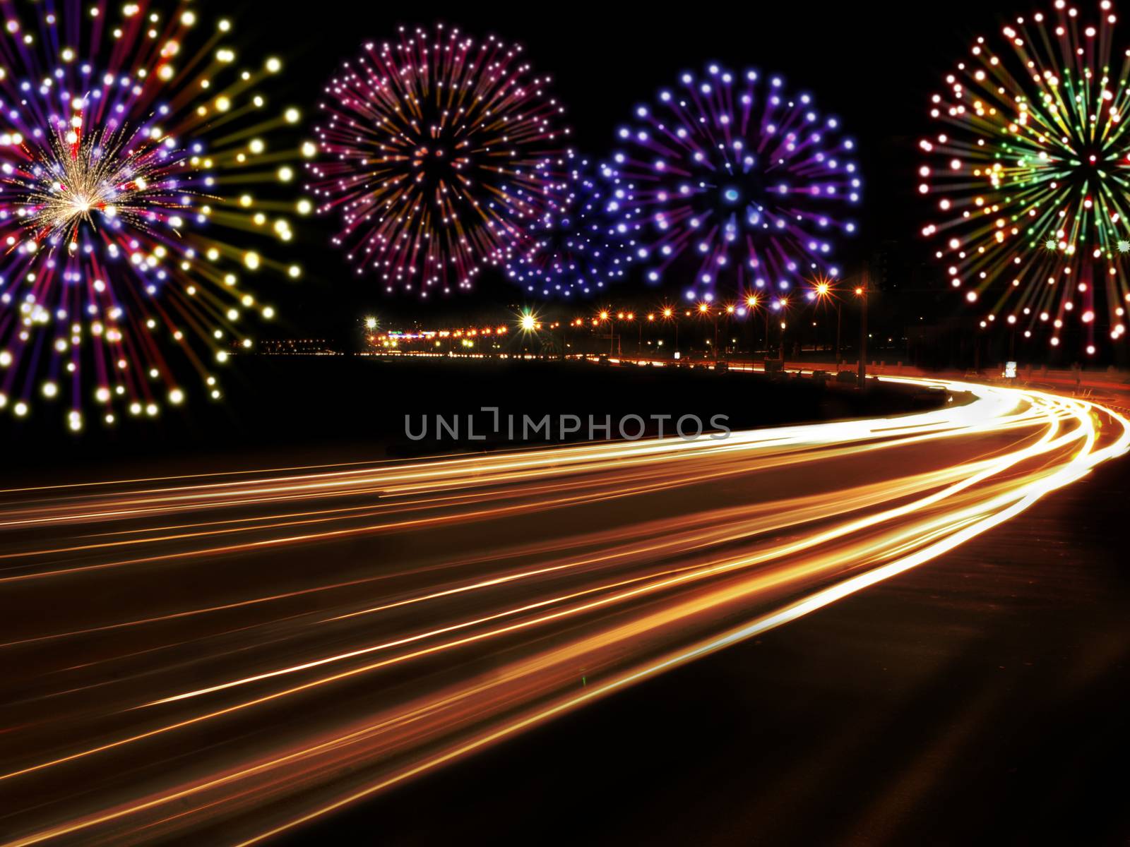 Happy New Year fireworks and city cars highway lights with copy space for your own text.