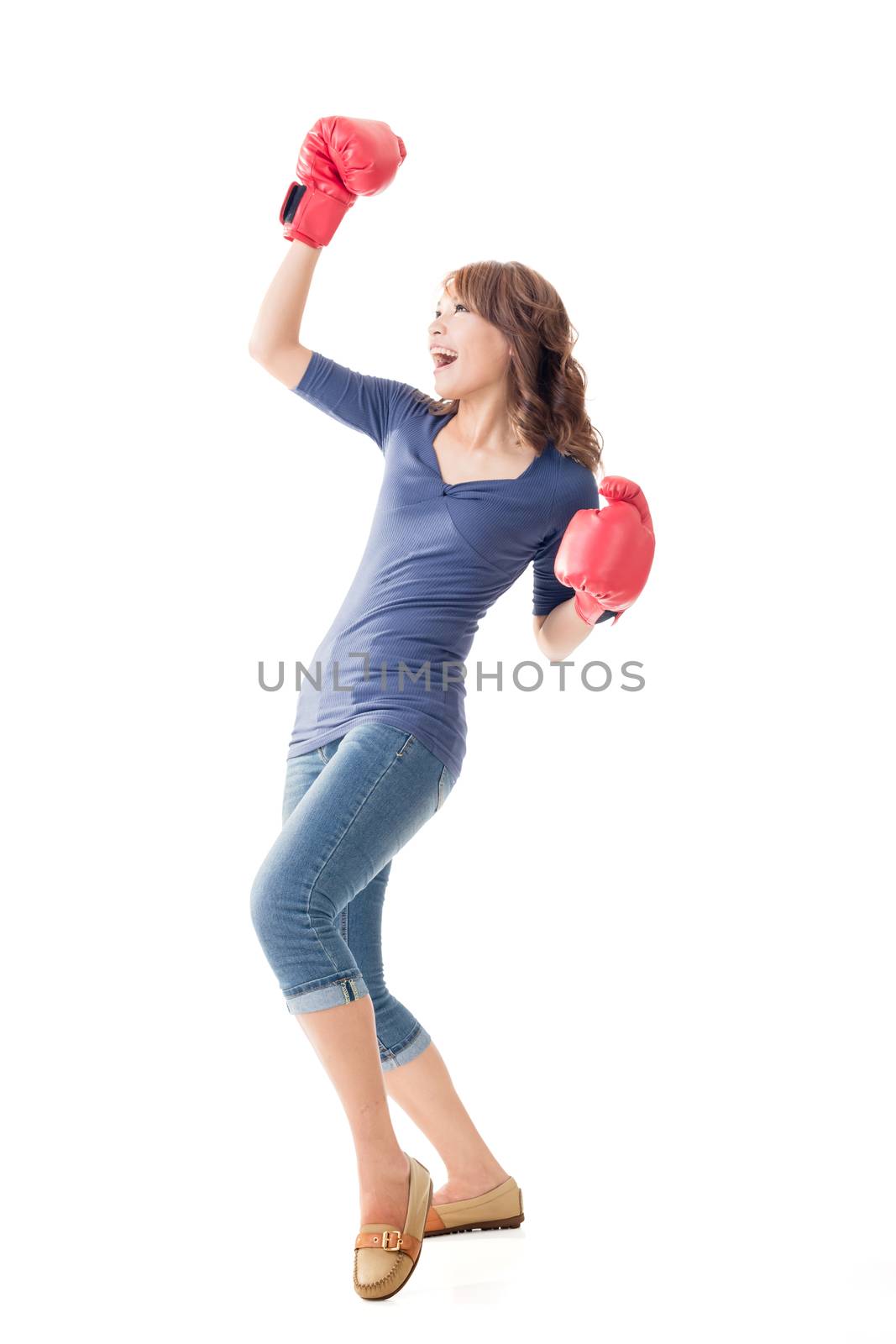 Fighting girl concept, rear view full length portrait of Asian isolated.