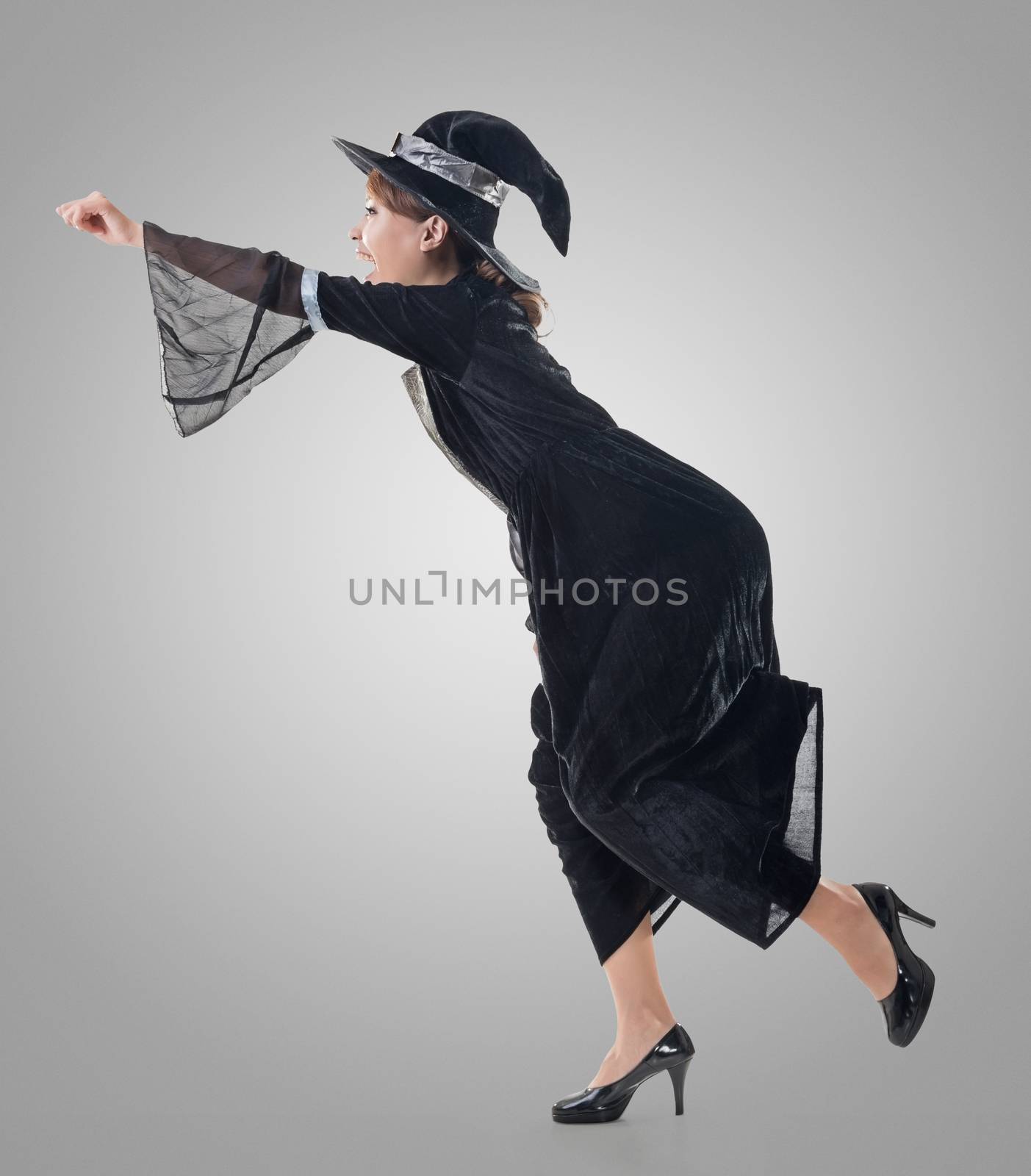 Asian witch riding something, full length portrait isolated.