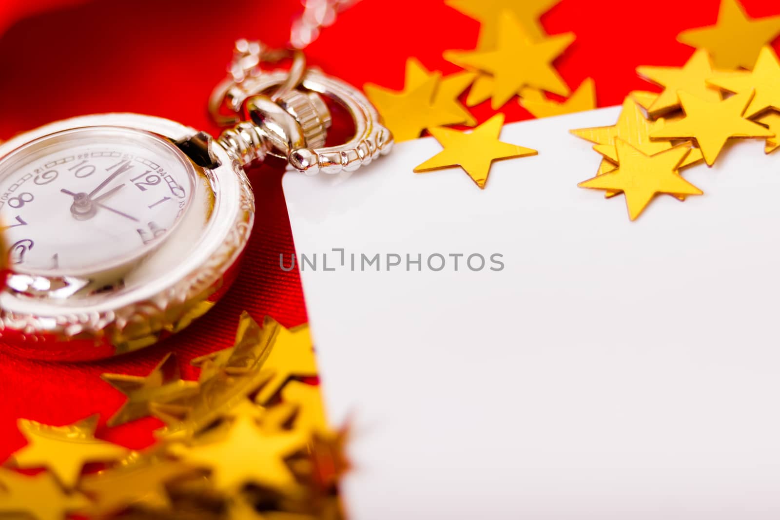 Christmas card. Beautiful background with a clock and decorations. macro