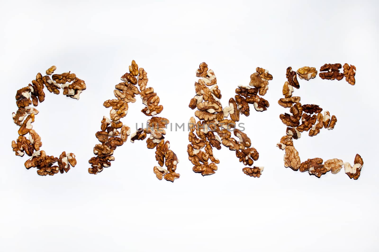 Cake sign with walnuts on the letters.