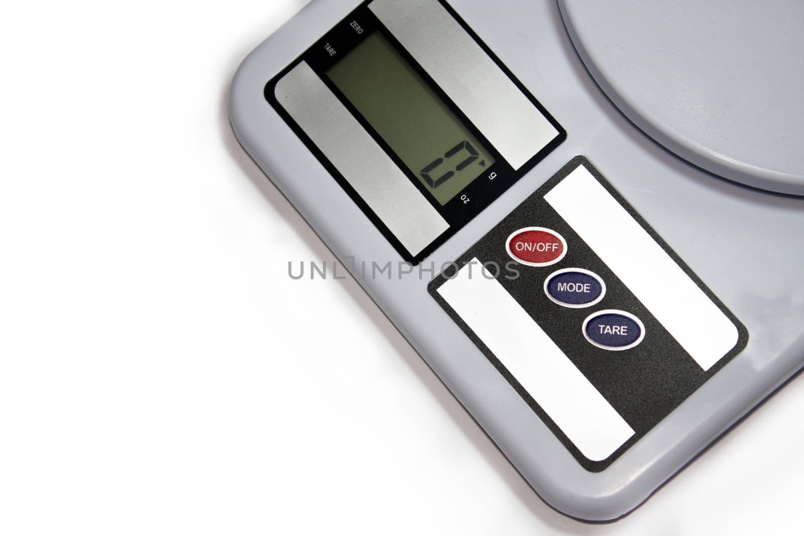 Digital kitchen scale on the white background.