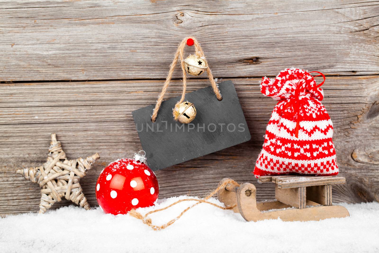 Christmas decoration with xmas canes, over wooden background