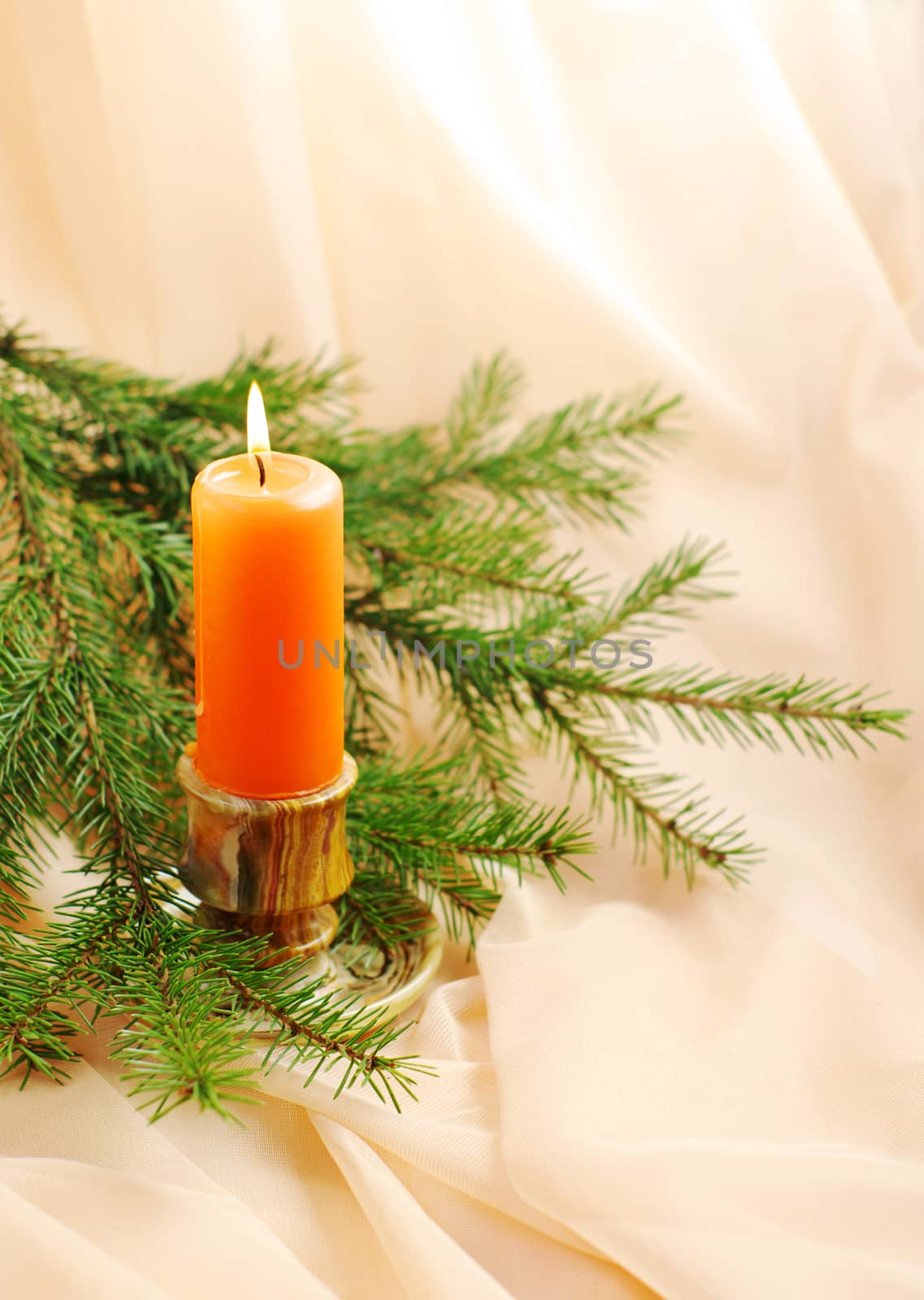 burning candle and fir twig by HGalina