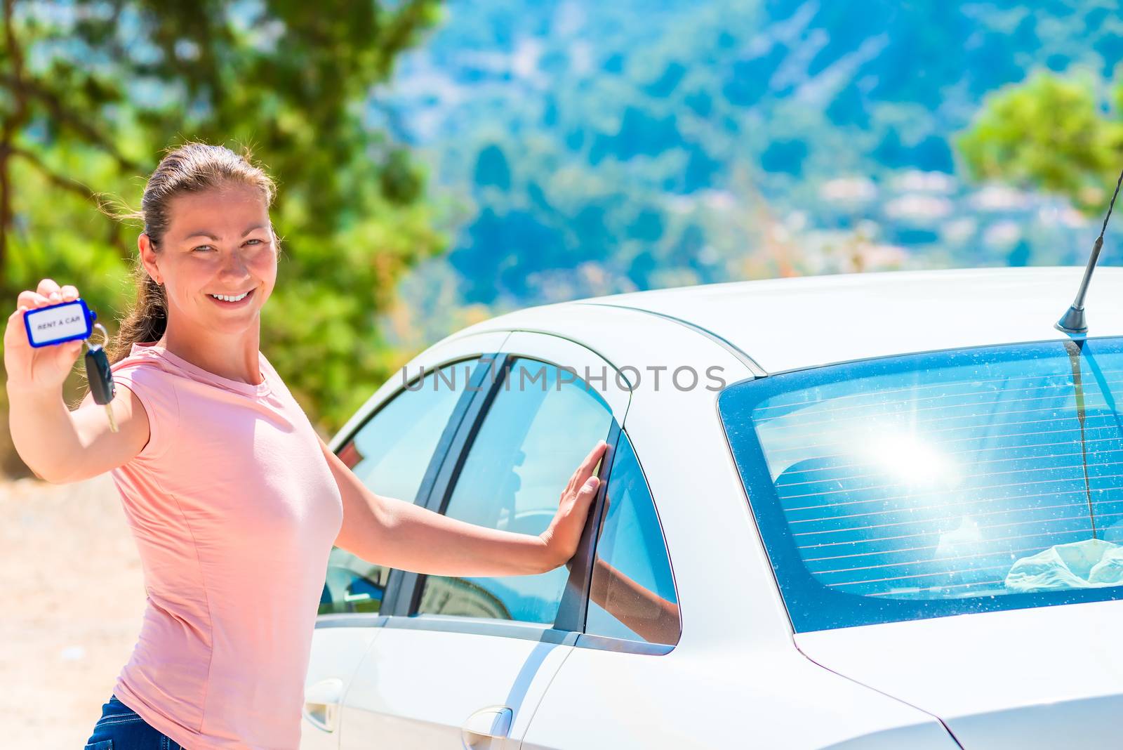 young beautiful girl took a white car rental