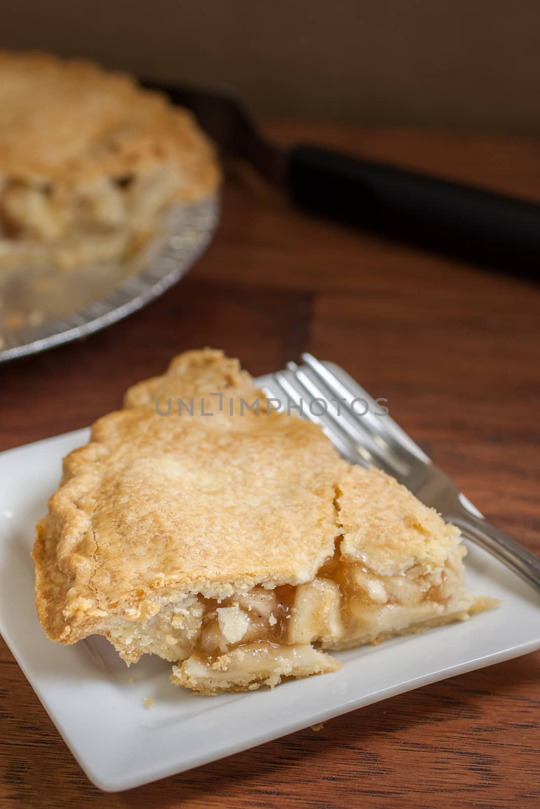 A rustic, handmade apple pie ready to searve.