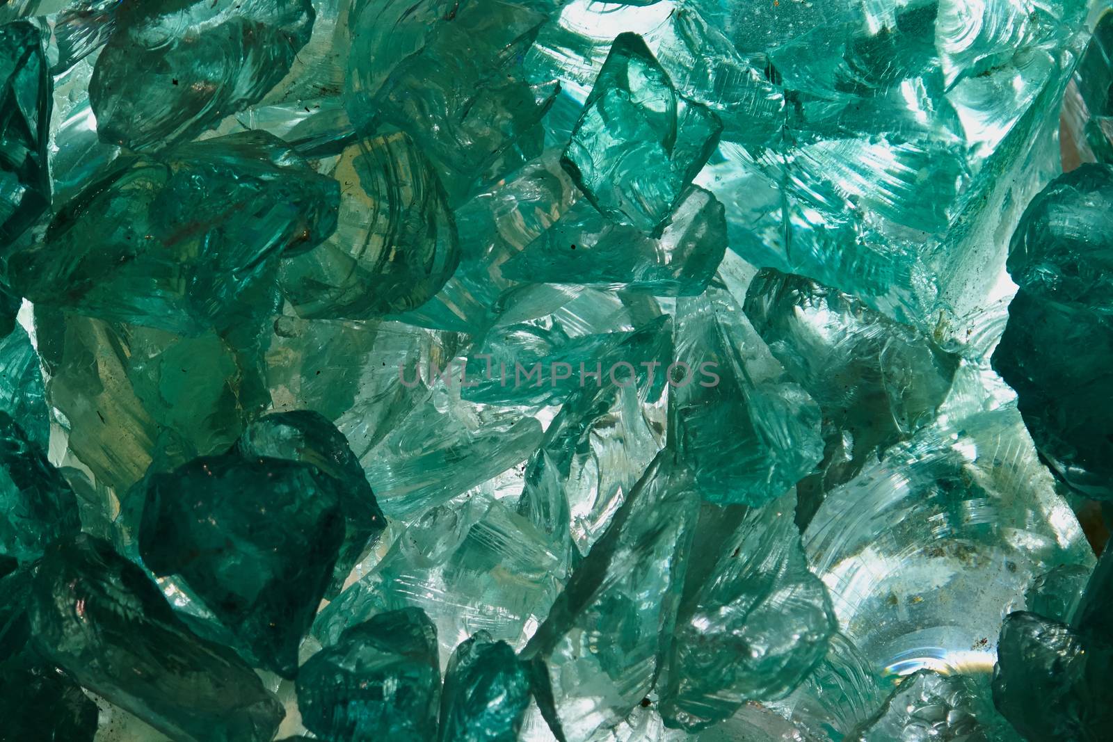 Raw aquamarine glass in close up view                     