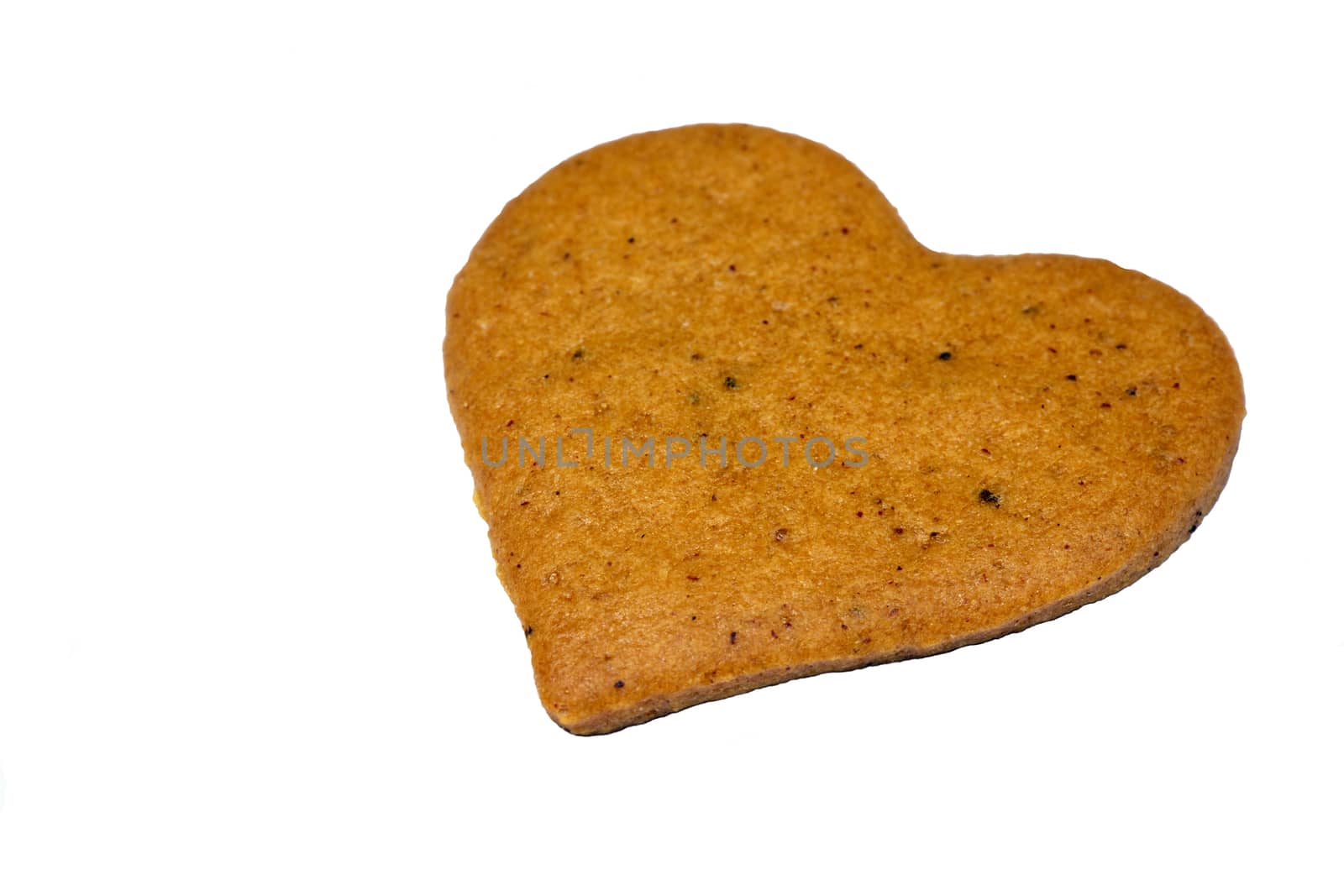 Photo of a gingerbread cookie isolated on white background. Located at a right of a screen. Food photography.