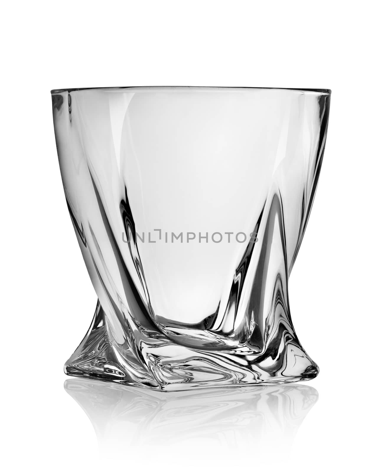 Figured glass for whiskey isolated on white