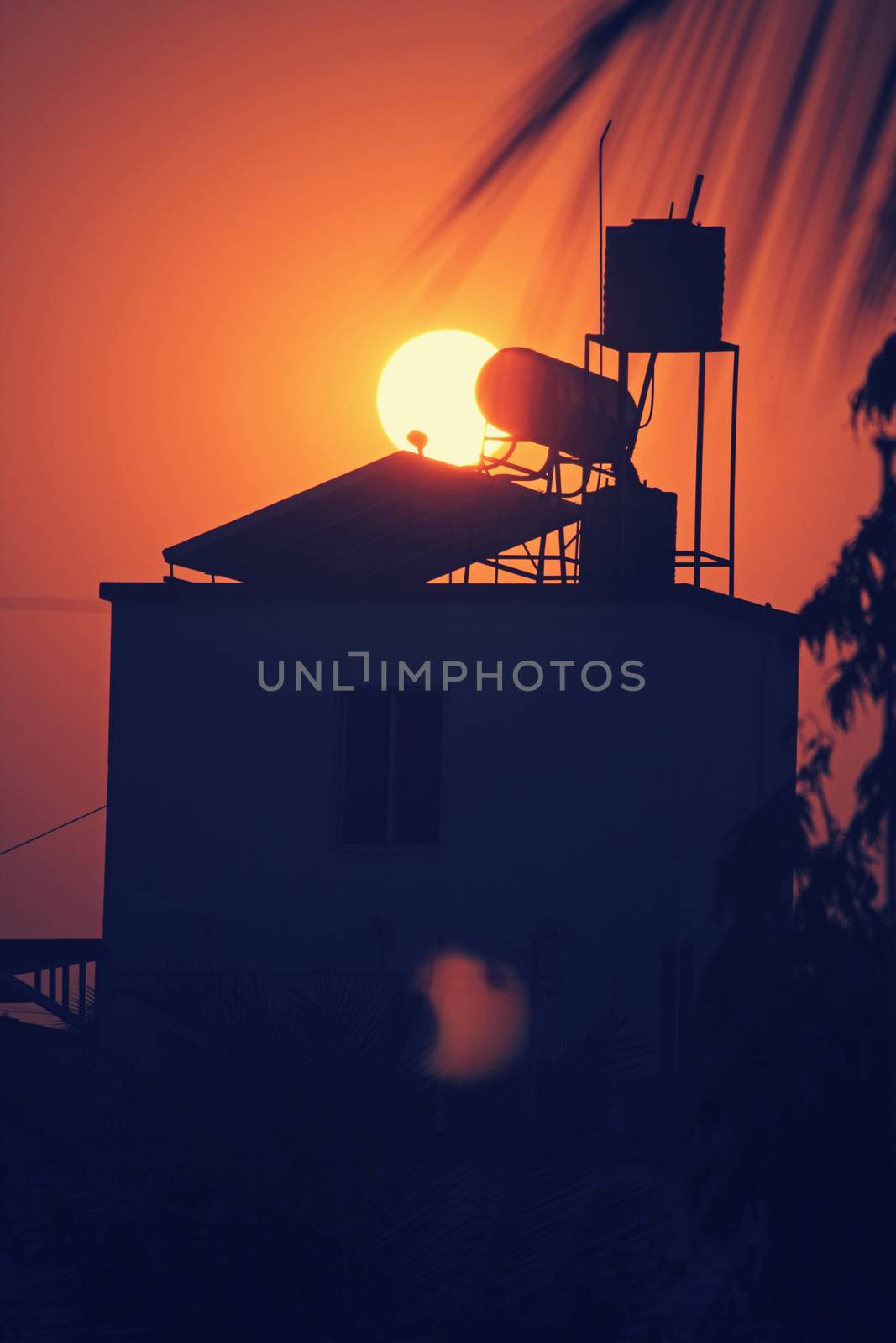 sun with water heater solar panel