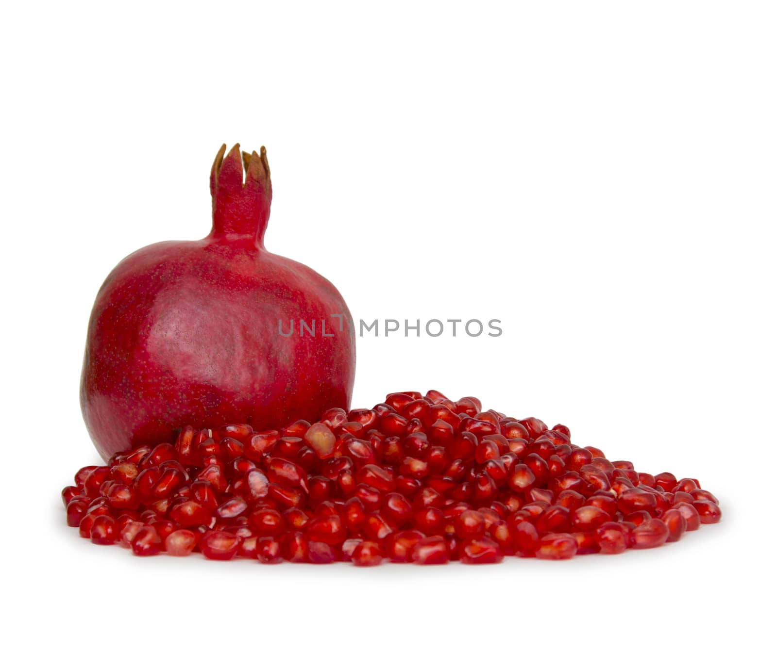 Ripe pomegranate fruit isolated on white background cutout