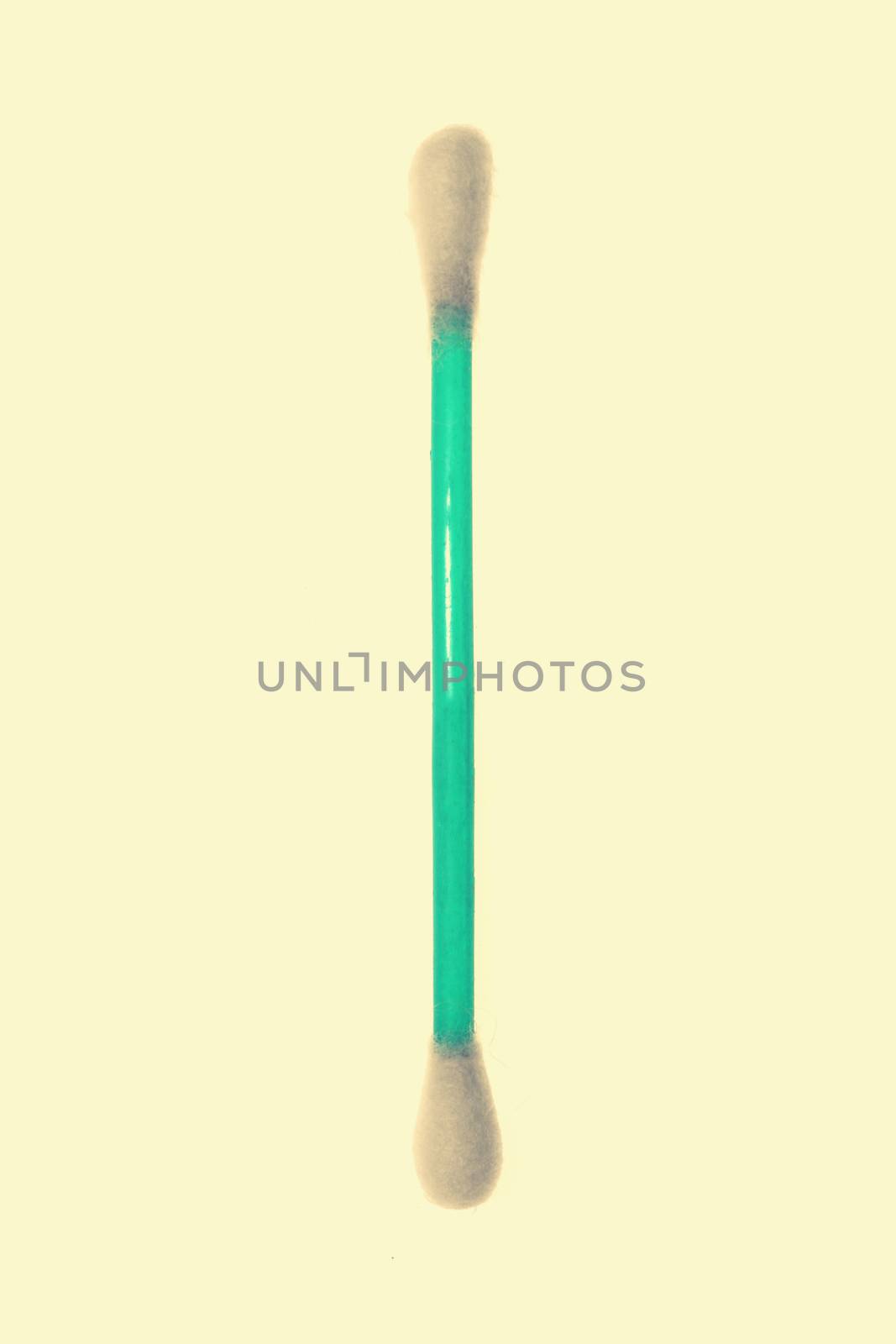 a cotton swab isolated on a white background