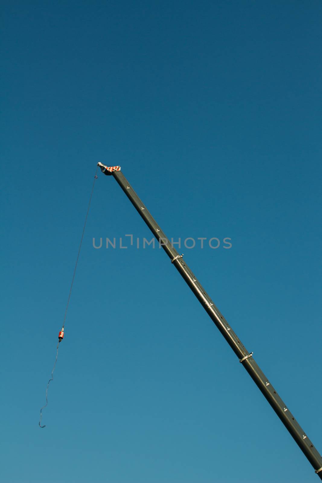 truck crane on the construction site,with blue sky