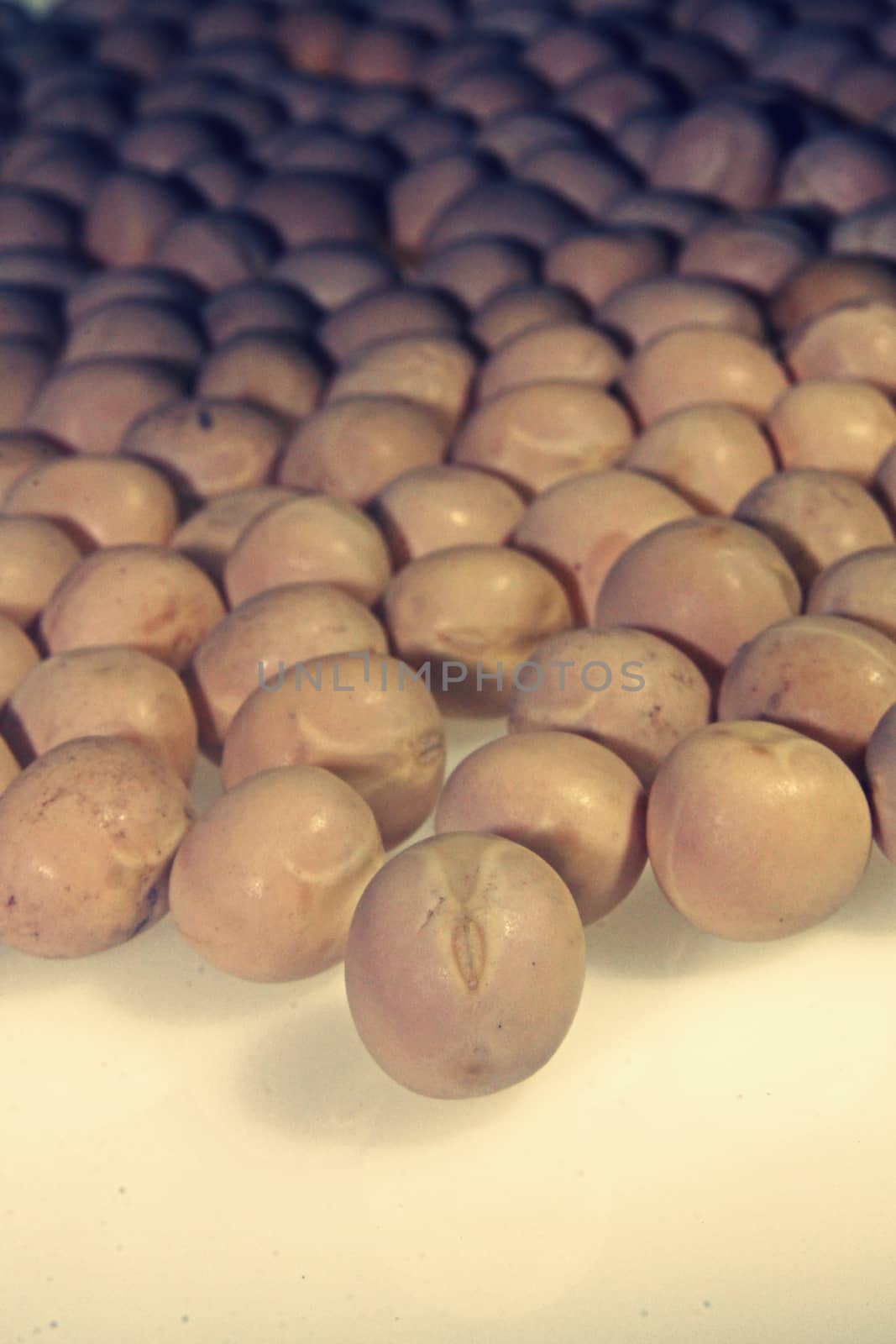 Close up view of scattered dried white pea