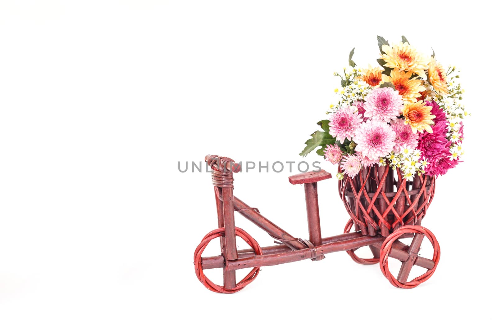 Flower in wooden handmade basket isolated on white background