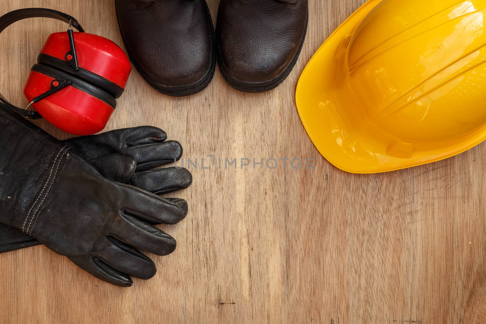 Closeup of assorted work tools on wood