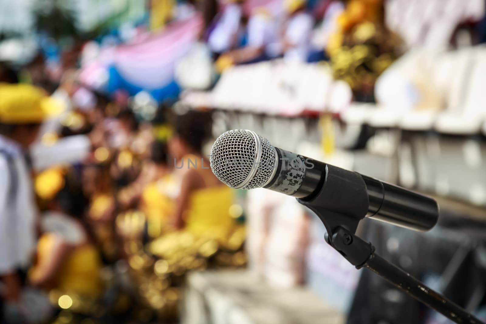 Close up of microphone in stadium by nanDphanuwat