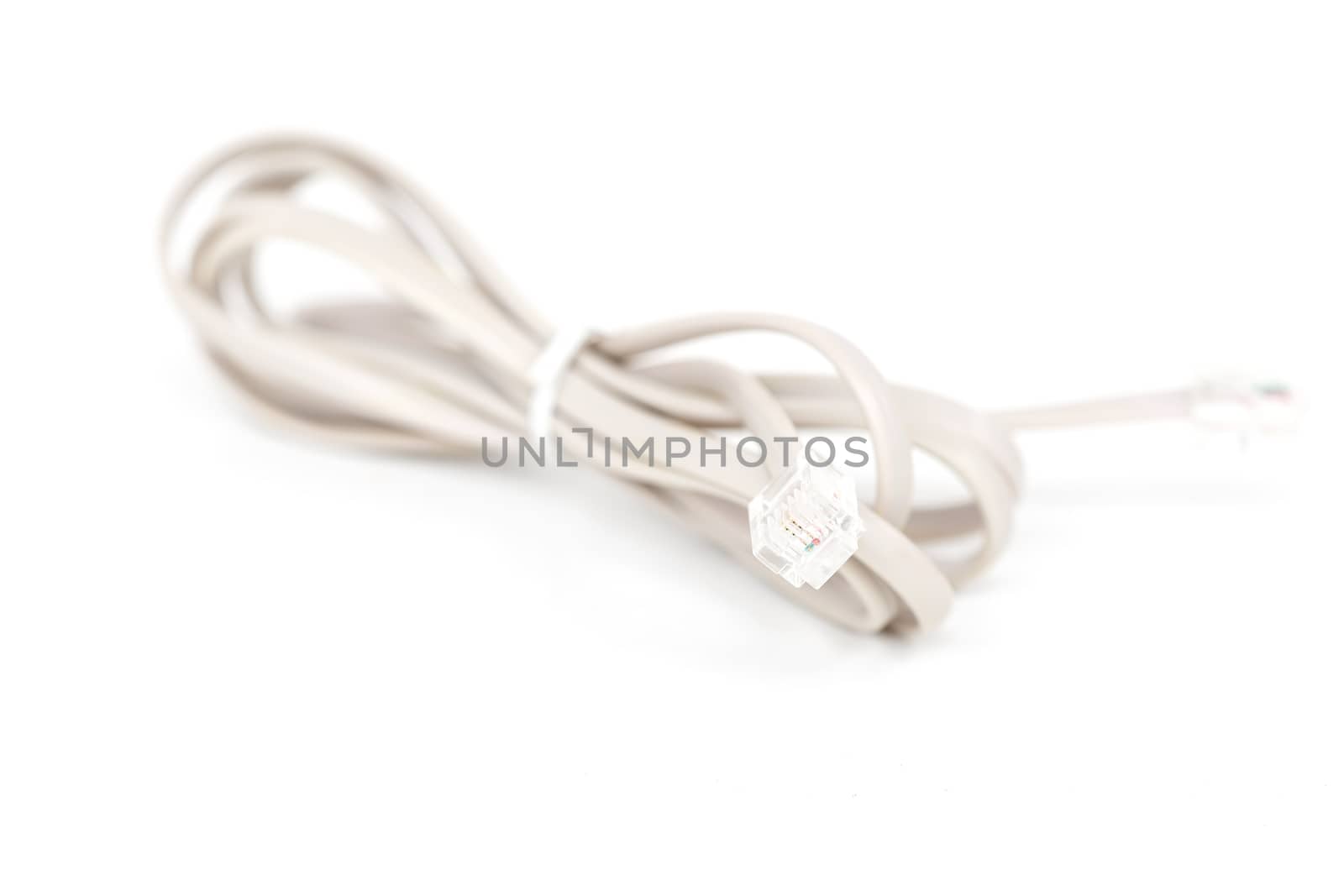 Telephone cable closeup, isolated on white background