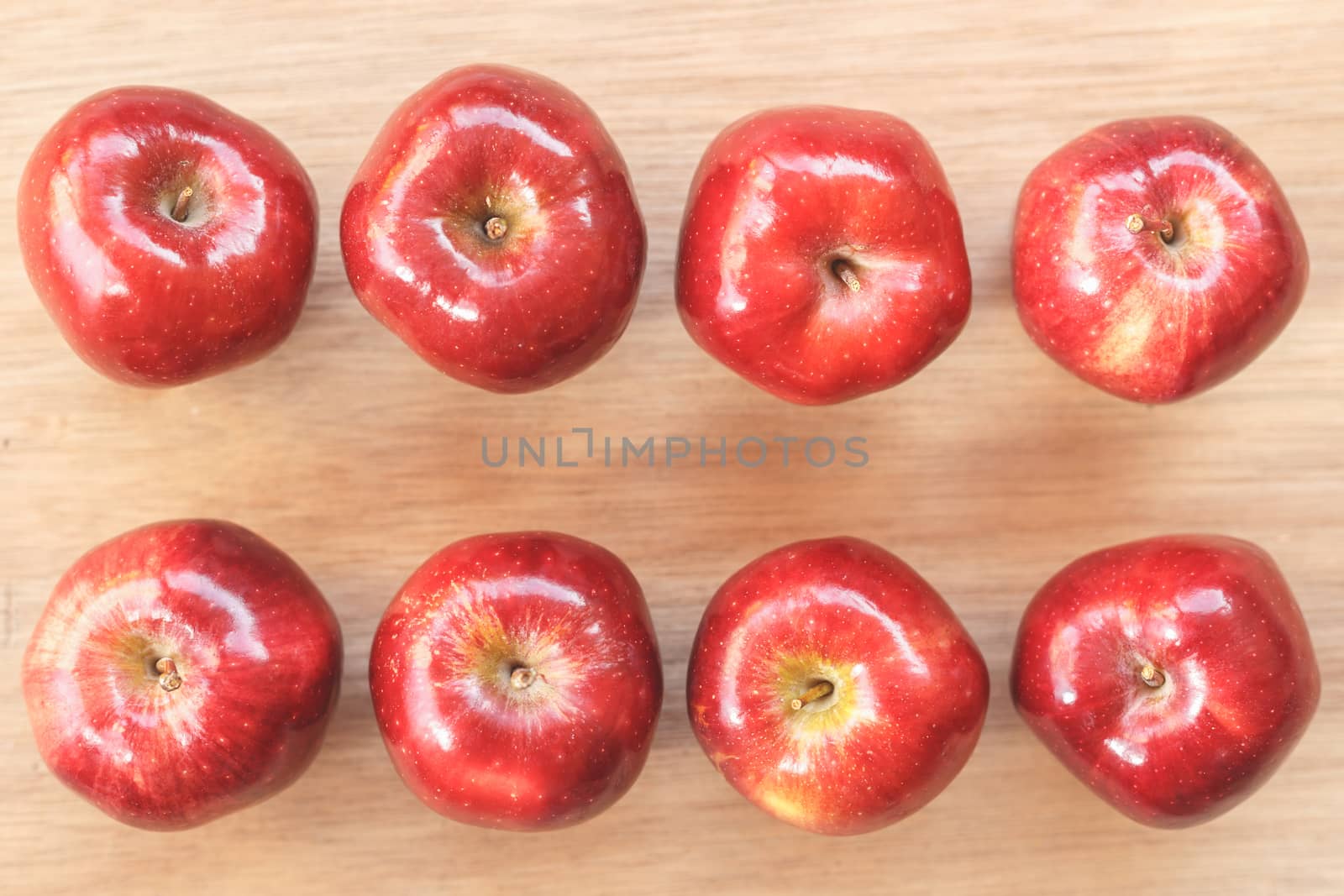 Red apple on wood